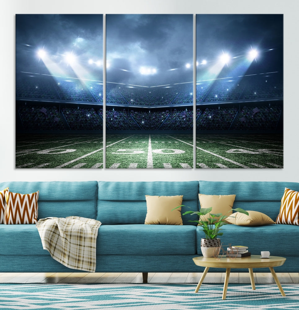 The *American Football Stadium Wall Art Canvas Print*, showcasing a lit football stadium, hangs prominently.