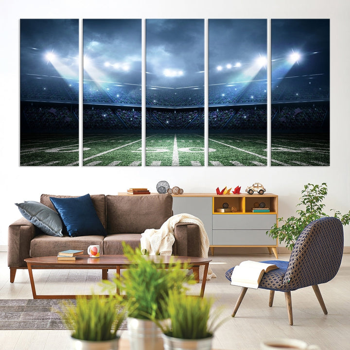 The *American Football Stadium Wall Art Canvas Print*, showcasing a lit football stadium, hangs prominently.