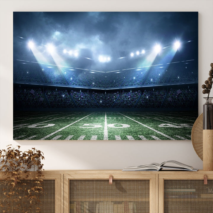 The *American Football Stadium Wall Art Canvas Print*, showcasing a lit football stadium, hangs prominently.