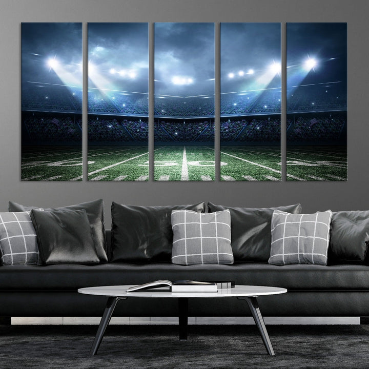 The *American Football Stadium Wall Art Canvas Print*, showcasing a lit football stadium, hangs prominently.