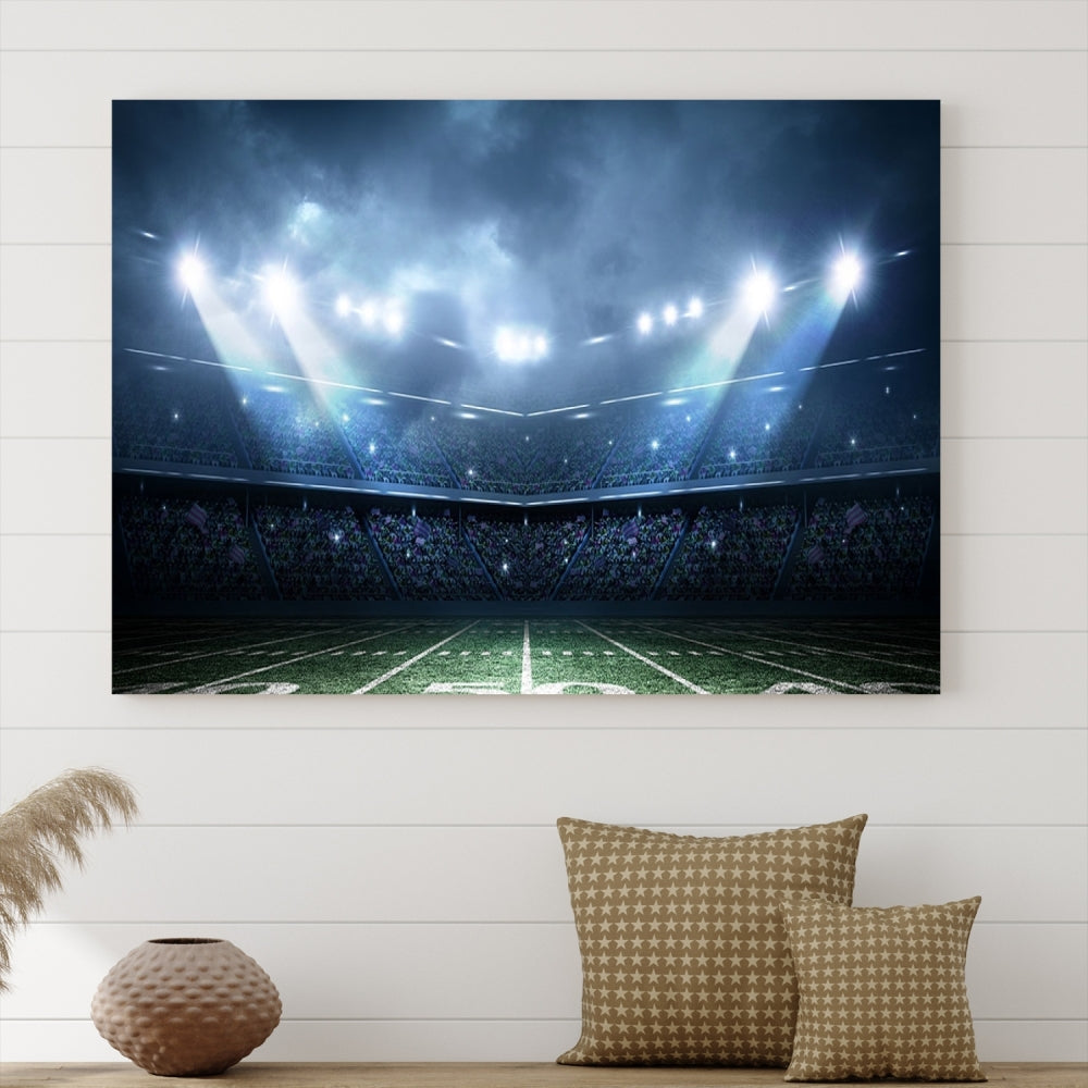 The *American Football Stadium Wall Art Canvas Print*, showcasing a lit football stadium, hangs prominently.