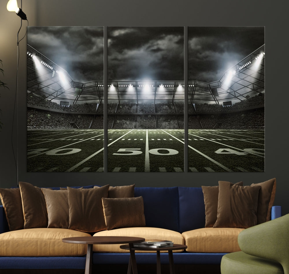 A print of an American football stadium elegantly hangs on the wall. This striking wall art piece, crafted on museum-quality canvas, features gallery wrapped edges for a polished appearance. Enjoy free shipping on this stunning artwork, known as the American Football Stadium Wall Art Canvas Print or Stadium Sport Wall Art Print.