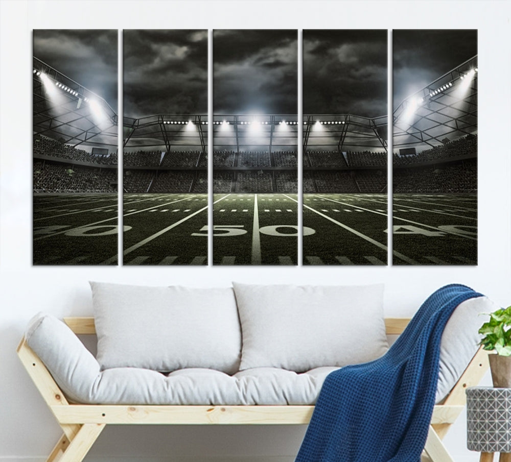 A print of an American football stadium elegantly hangs on the wall. This striking wall art piece, crafted on museum-quality canvas, features gallery wrapped edges for a polished appearance. Enjoy free shipping on this stunning artwork, known as the American Football Stadium Wall Art Canvas Print or Stadium Sport Wall Art Print.