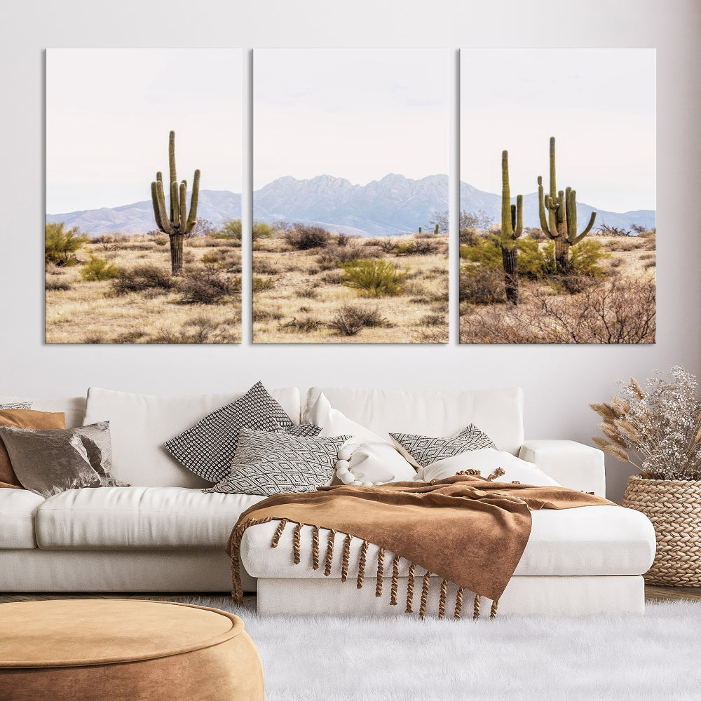 The Arizona Desert Wall Art Print, featuring saguaro cacti and framed for a farmhouse decor aesthetic, beautifully highlights a Southwestern landscape with distant mountains.