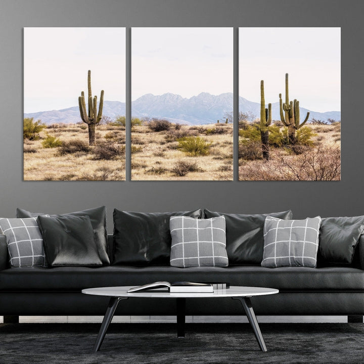 The Arizona Desert Wall Art Print, featuring saguaro cacti and framed for a farmhouse decor aesthetic, beautifully highlights a Southwestern landscape with distant mountains.