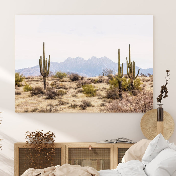 The Arizona Desert Wall Art Print, featuring saguaro cacti and framed for a farmhouse decor aesthetic, beautifully highlights a Southwestern landscape with distant mountains.