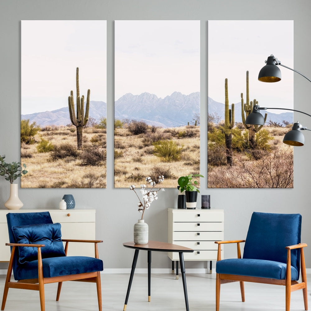 The Arizona Desert Wall Art Print, featuring saguaro cacti and framed for a farmhouse decor aesthetic, beautifully highlights a Southwestern landscape with distant mountains.