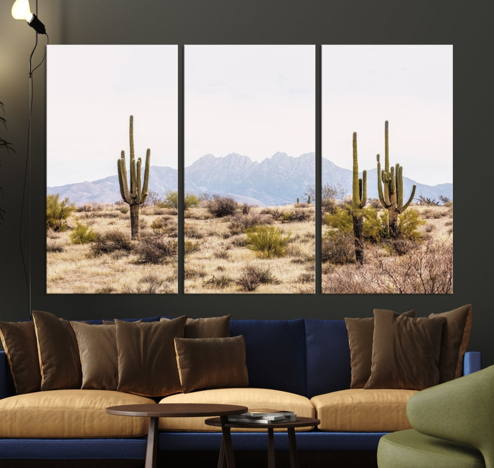 The Arizona Desert Wall Art Print, featuring saguaro cacti and framed for a farmhouse decor aesthetic, beautifully highlights a Southwestern landscape with distant mountains.