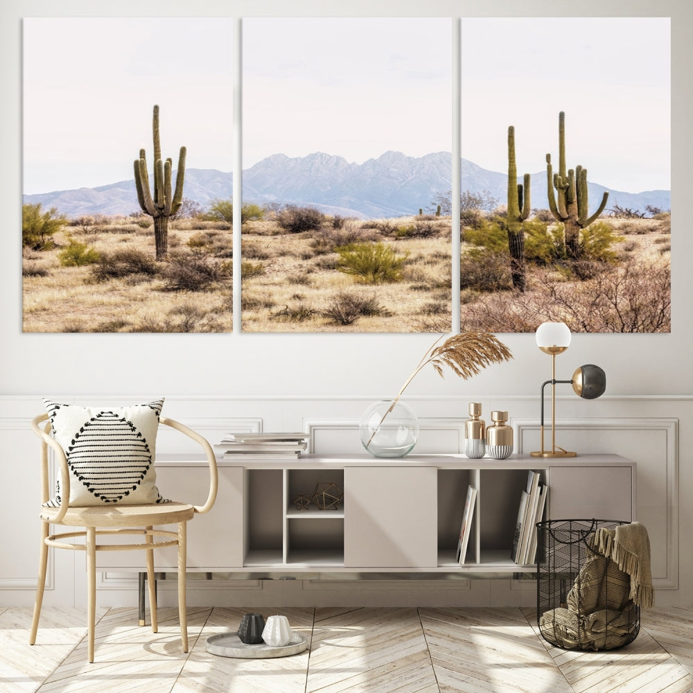 The Arizona Desert Wall Art Print, featuring saguaro cacti and framed for a farmhouse decor aesthetic, beautifully highlights a Southwestern landscape with distant mountains.