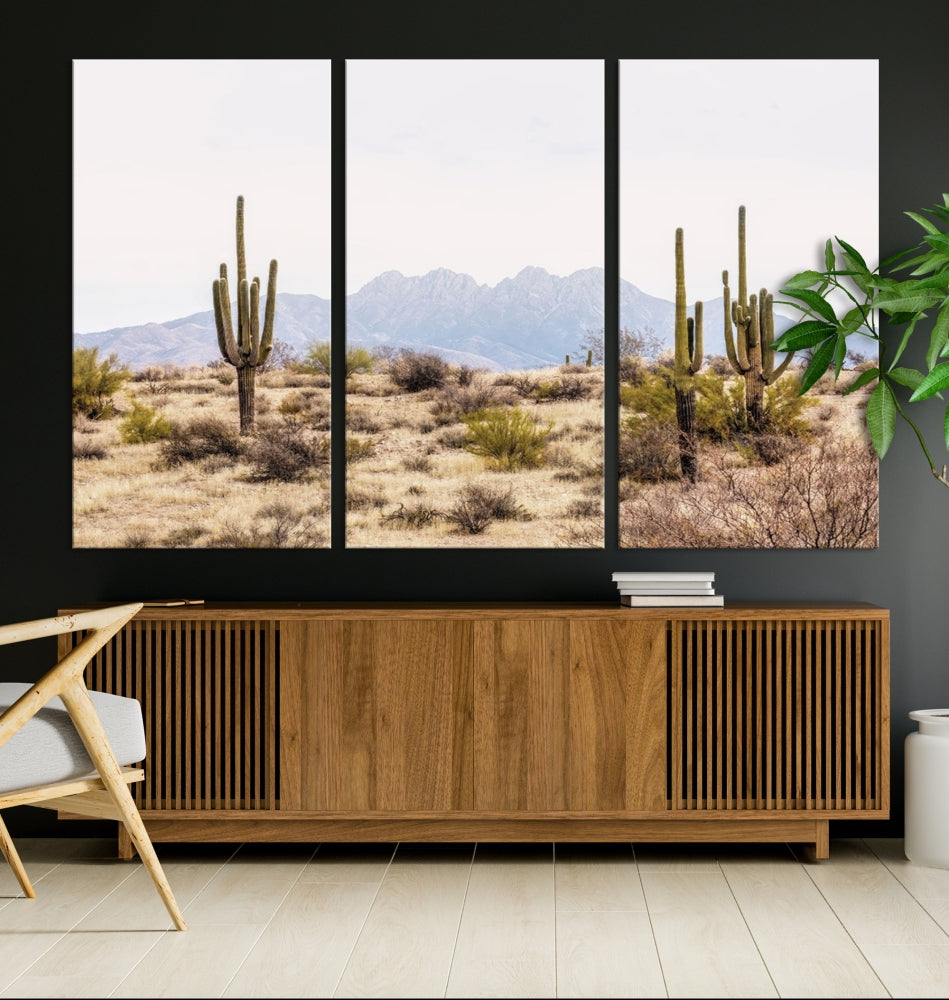 The Arizona Desert Wall Art Print, featuring saguaro cacti and framed for a farmhouse decor aesthetic, beautifully highlights a Southwestern landscape with distant mountains.