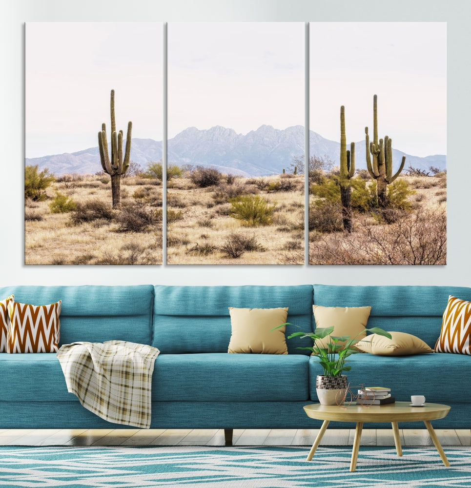 The Arizona Desert Wall Art Print, featuring saguaro cacti and framed for a farmhouse decor aesthetic, beautifully highlights a Southwestern landscape with distant mountains.