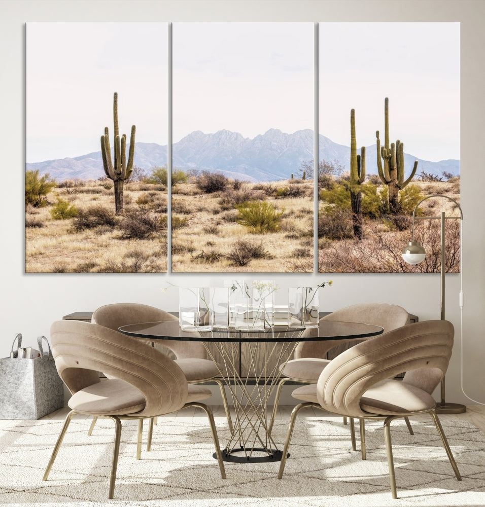 The Arizona Desert Wall Art Print, featuring saguaro cacti and framed for a farmhouse decor aesthetic, beautifully highlights a Southwestern landscape with distant mountains.