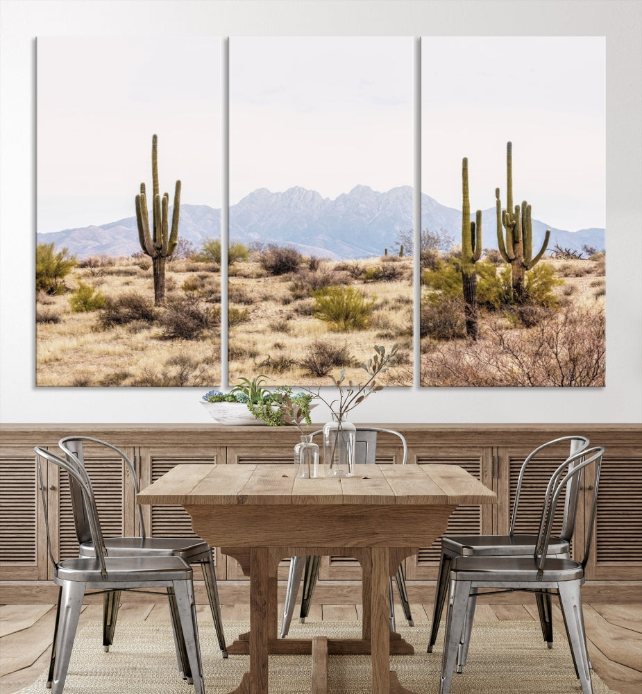 The Arizona Desert Wall Art Print, featuring saguaro cacti and framed for a farmhouse decor aesthetic, beautifully highlights a Southwestern landscape with distant mountains.