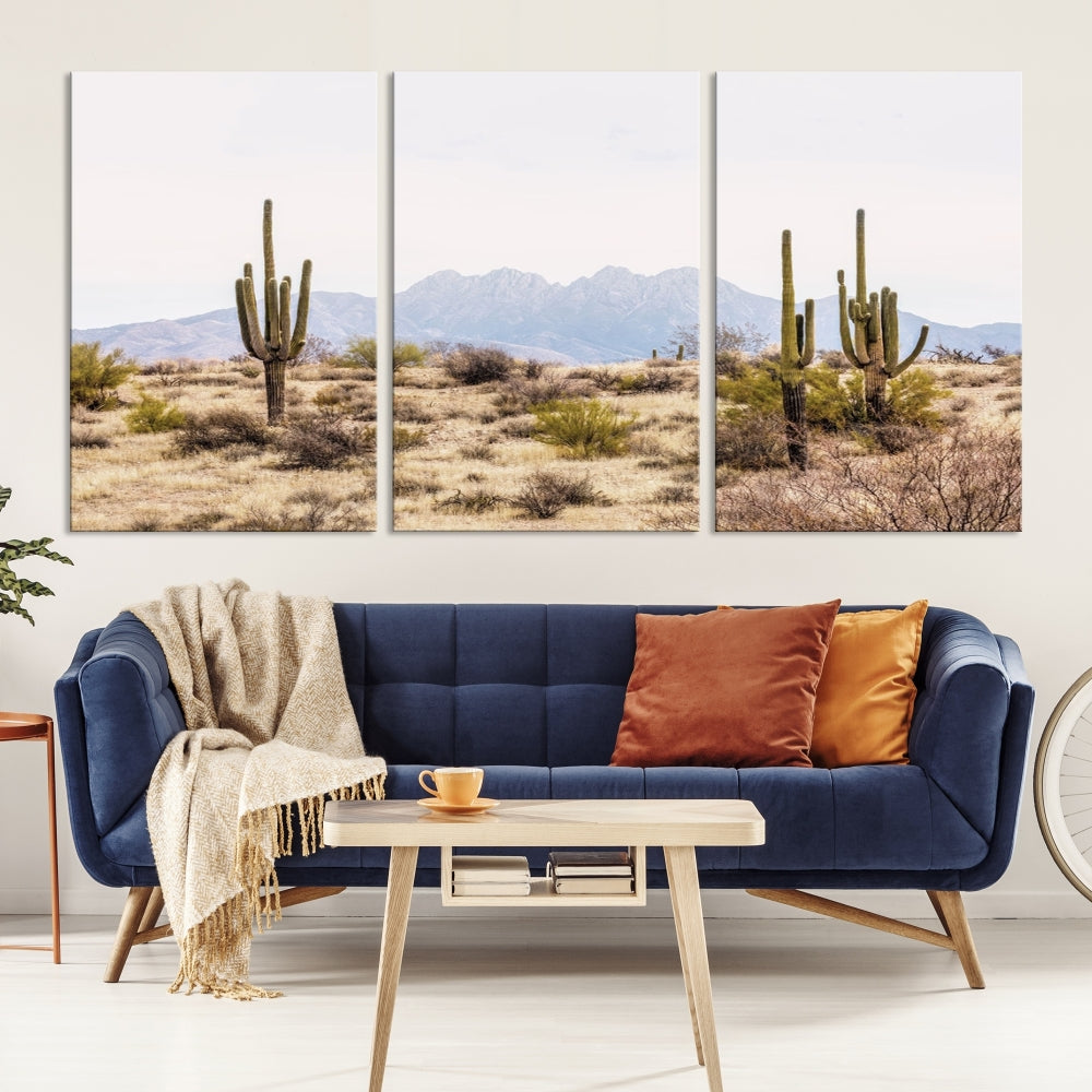 The Arizona Desert Wall Art Print, featuring saguaro cacti and framed for a farmhouse decor aesthetic, beautifully highlights a Southwestern landscape with distant mountains.