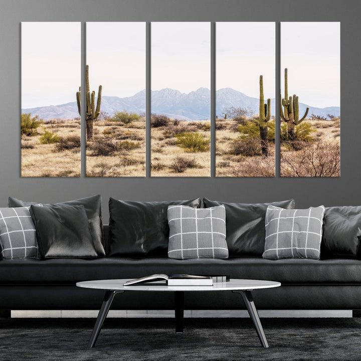 The Arizona Desert Wall Art Print, featuring saguaro cacti and framed for a farmhouse decor aesthetic, beautifully highlights a Southwestern landscape with distant mountains.