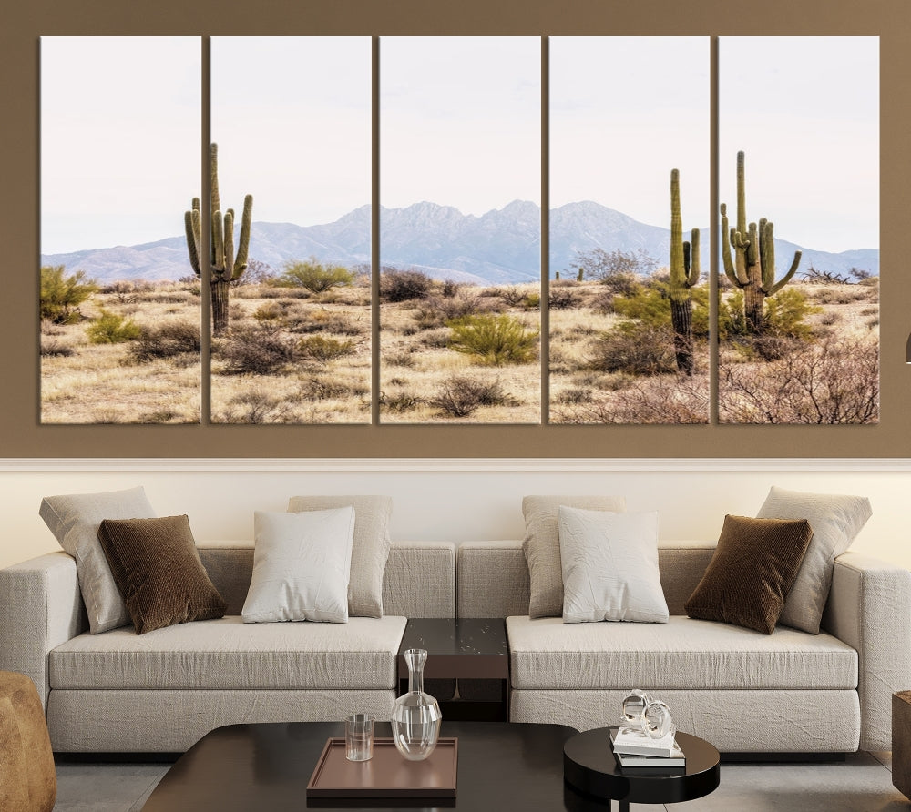 The Arizona Desert Wall Art Print, featuring saguaro cacti and framed for a farmhouse decor aesthetic, beautifully highlights a Southwestern landscape with distant mountains.