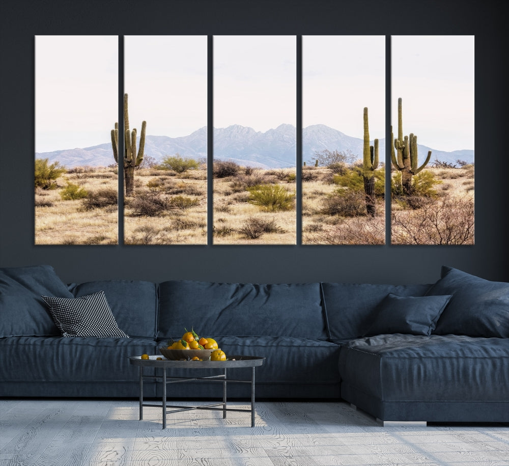 The Arizona Desert Wall Art Print, featuring saguaro cacti and framed for a farmhouse decor aesthetic, beautifully highlights a Southwestern landscape with distant mountains.