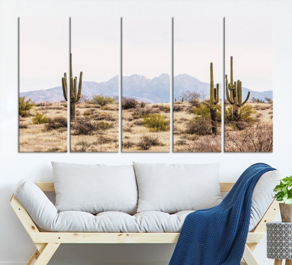 The Arizona Desert Wall Art Print, featuring saguaro cacti and framed for a farmhouse decor aesthetic, beautifully highlights a Southwestern landscape with distant mountains.