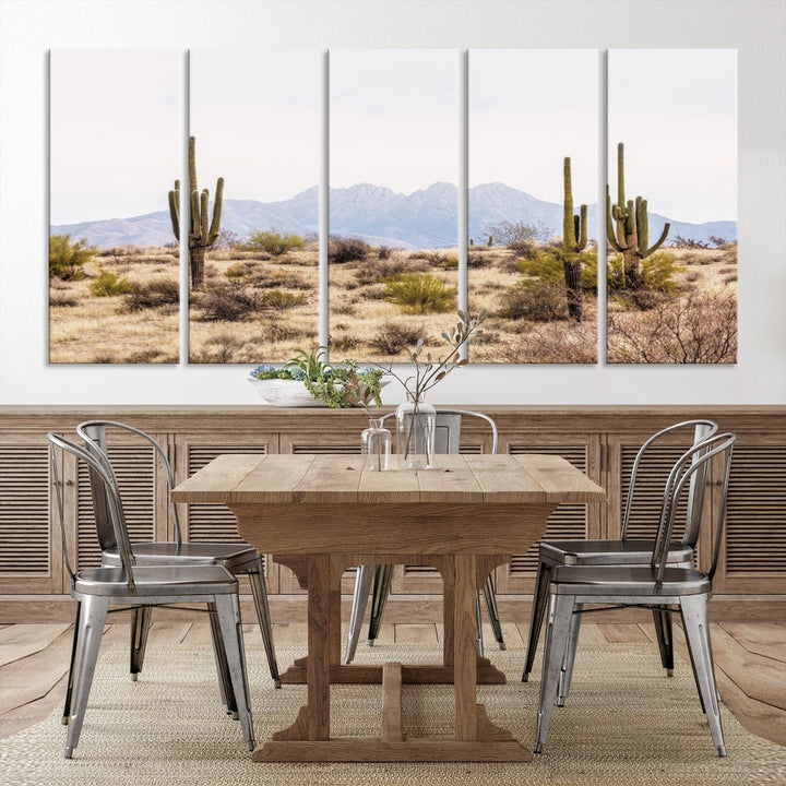 The Arizona Desert Wall Art Print, featuring saguaro cacti and framed for a farmhouse decor aesthetic, beautifully highlights a Southwestern landscape with distant mountains.