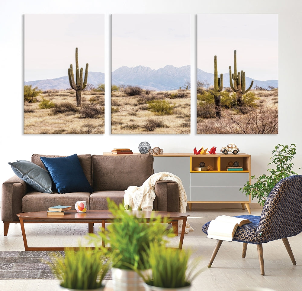 The Arizona Desert Wall Art Print, featuring saguaro cacti and framed for a farmhouse decor aesthetic, beautifully highlights a Southwestern landscape with distant mountains.