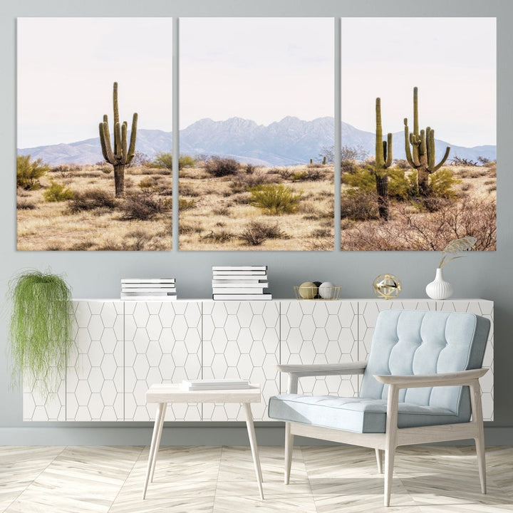 The Arizona Desert Wall Art Print, featuring saguaro cacti and framed for a farmhouse decor aesthetic, beautifully highlights a Southwestern landscape with distant mountains.