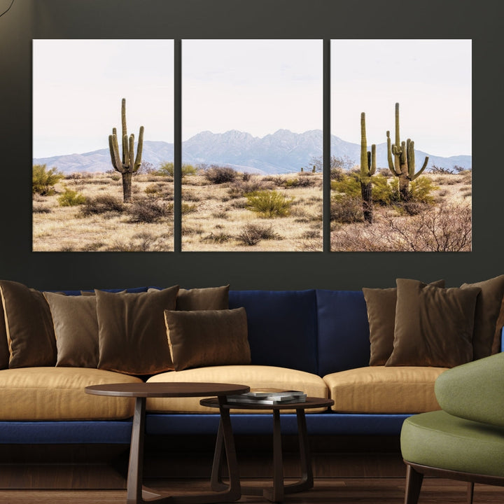 The Arizona Desert Wall Art Print, featuring saguaro cacti and framed for a farmhouse decor aesthetic, beautifully highlights a Southwestern landscape with distant mountains.