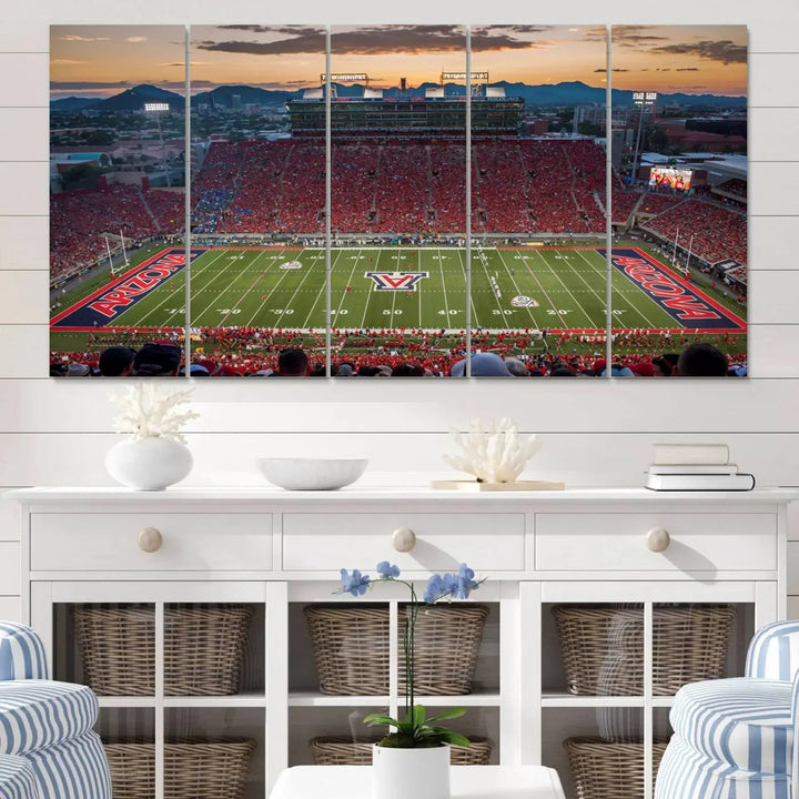 The Arizona Wildcats Football Team Print, a stunning canvas depiction of the Tucson Arizona Stadium at sunset, elegantly hangs in the room.