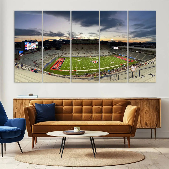 The Arizona Wildcats Football Team Print, featuring the Tucson Arizona Stadium at sunset, is elegantly displayed. This museum-quality canvas split art offers a breathtaking visual experience. The ready-to-hang, high-resolution print brings the scene to life with vibrant details.