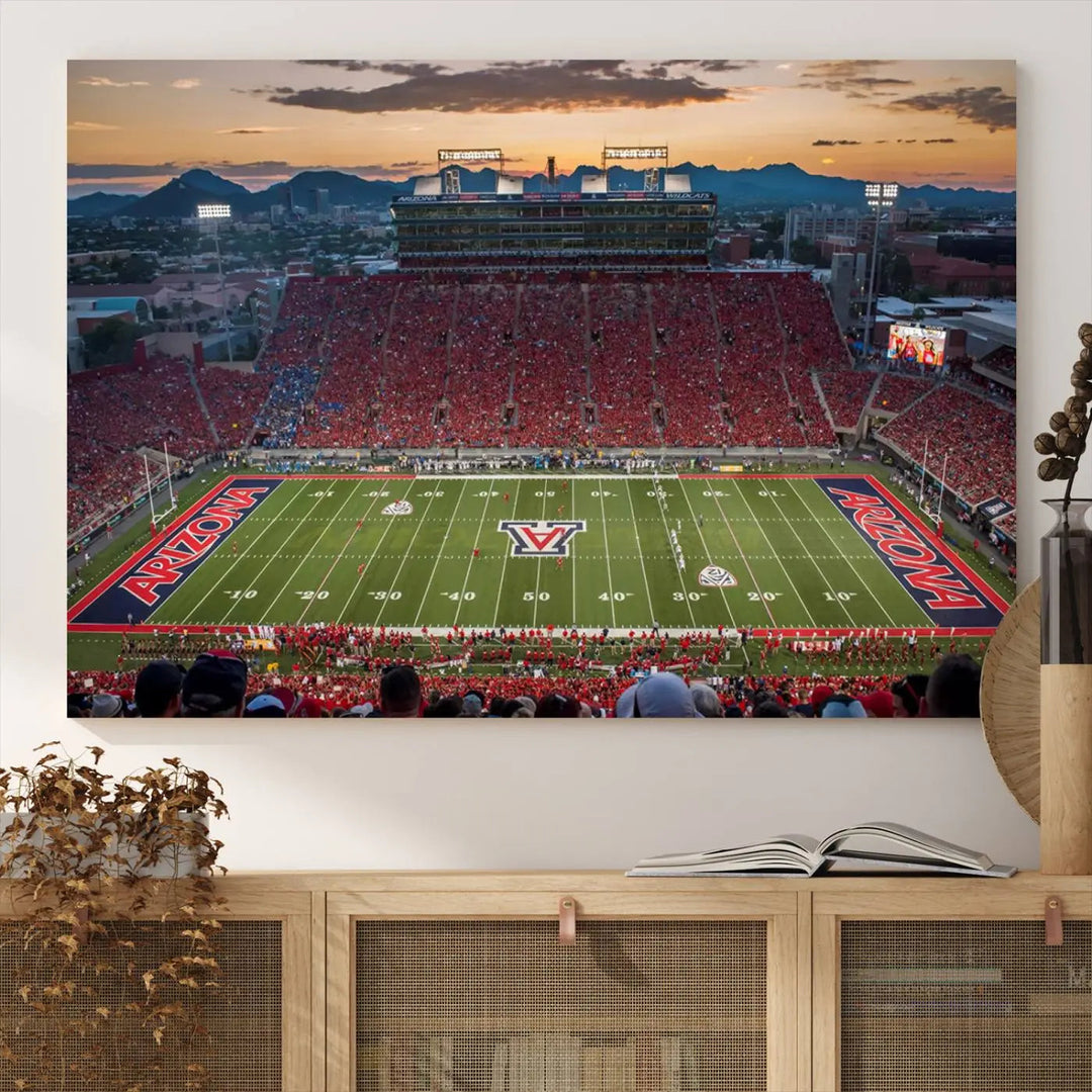 The Arizona Wildcats Football Team Print, a stunning canvas depiction of the Tucson Arizona Stadium at sunset, elegantly hangs in the room.