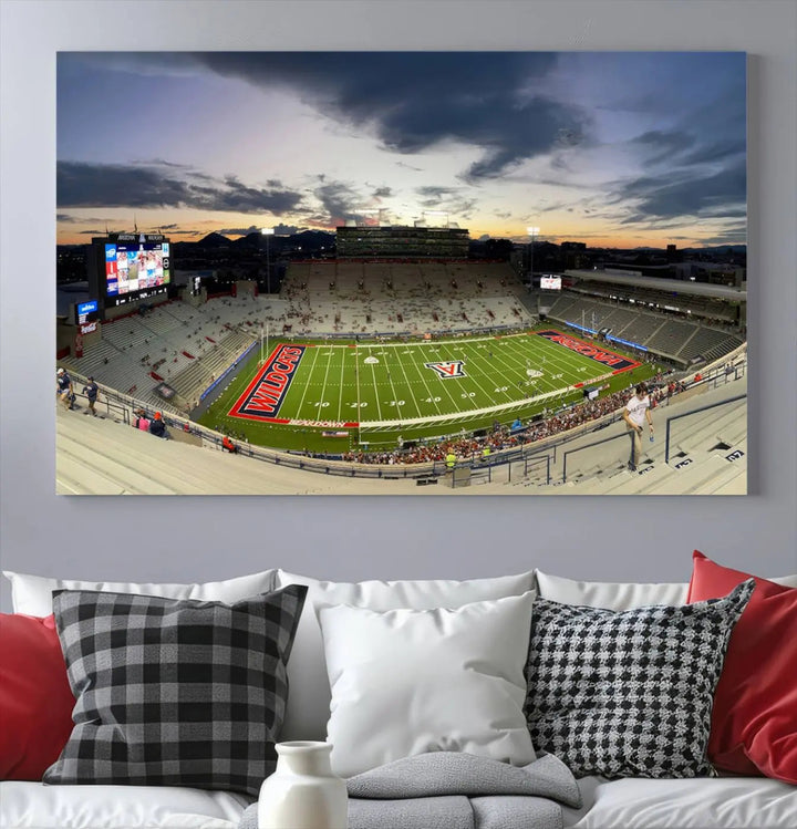 The Arizona Wildcats Football Team Print, featuring the Tucson Arizona Stadium at sunset, is elegantly displayed. This museum-quality canvas split art offers a breathtaking visual experience. The ready-to-hang, high-resolution print brings the scene to life with vibrant details.