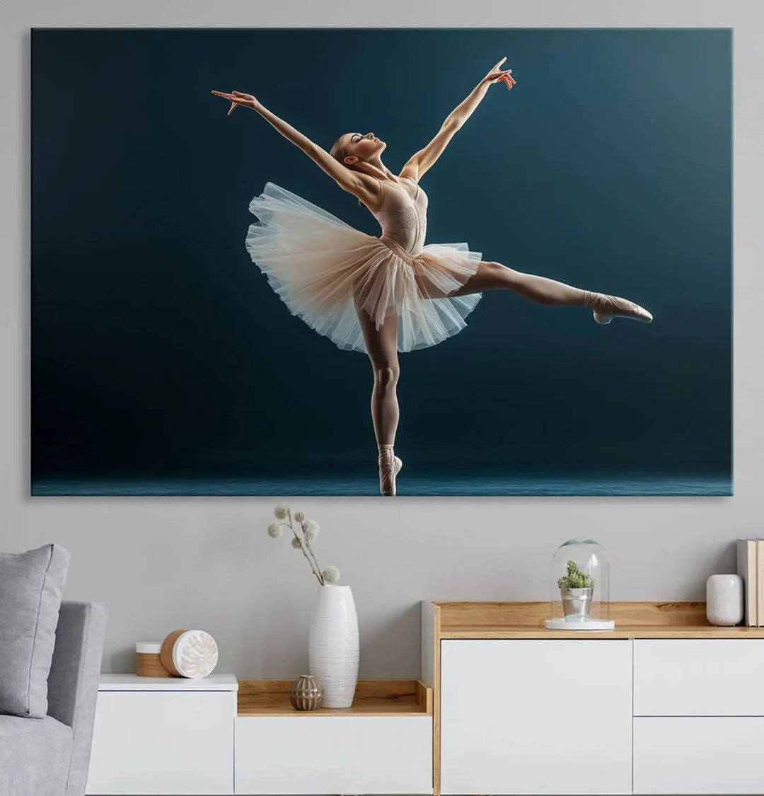 This stunning Ballerina Canvas Wall Art Print captures the elegance of a ballet dancer in motion, beautifully highlighted against a stage-like backdrop with delicate decor and natural elements. As graceful dance-inspired wall decor, it adds an element of grace and movement to any living room, office, or bedroom and is ready to hang.