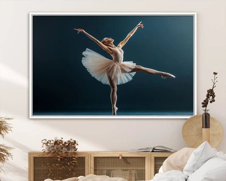 This stunning Ballerina Canvas Wall Art Print captures the elegance of a ballet dancer in motion, beautifully highlighted against a stage-like backdrop with delicate decor and natural elements. As graceful dance-inspired wall decor, it adds an element of grace and movement to any living room, office, or bedroom and is ready to hang.