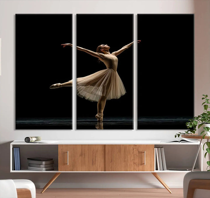 Displayed in a modern, minimalistic room is the Ballerina Canvas Wall Art Print titled "Elegant Ballet Dancer in Motion," an exquisite dance-inspired wall decor that captures the grace of a ballerina.