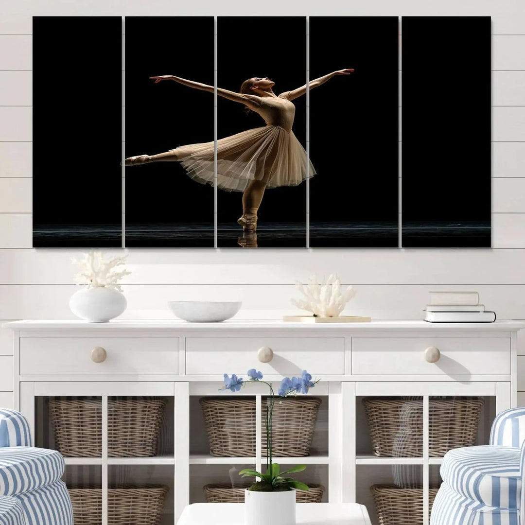 Displayed in a modern, minimalistic room is the Ballerina Canvas Wall Art Print titled "Elegant Ballet Dancer in Motion," an exquisite dance-inspired wall decor that captures the grace of a ballerina.