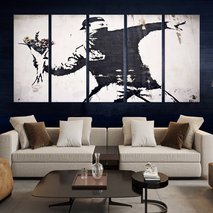 The living room features a split-panel art piece named "Banksy Flower Throw Graffiti Street Wall Art Canvas Print," gallery wrapped on museum-quality polycotton canvas and accentuated by modern decor elements.