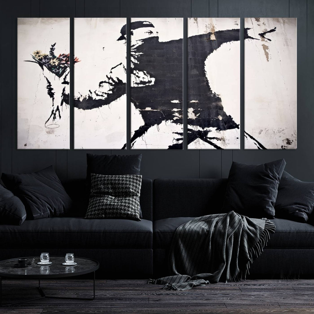 The living room features a split-panel art piece named "Banksy Flower Throw Graffiti Street Wall Art Canvas Print," gallery wrapped on museum-quality polycotton canvas and accentuated by modern decor elements.