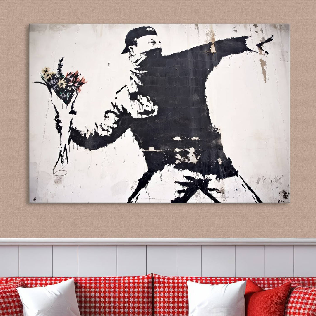 The living room features a split-panel art piece named "Banksy Flower Throw Graffiti Street Wall Art Canvas Print," gallery wrapped on museum-quality polycotton canvas and accentuated by modern decor elements.