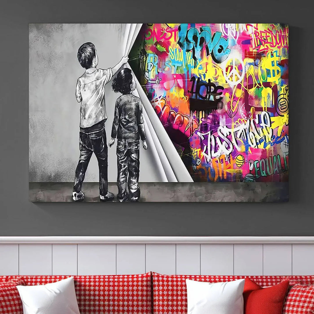 The Banksy Print - Street Art Canvas features a vibrant and bold image of two children lifting a curtain to reveal colorful graffiti. It's ready to hang, adding an urban modern decor vibe.