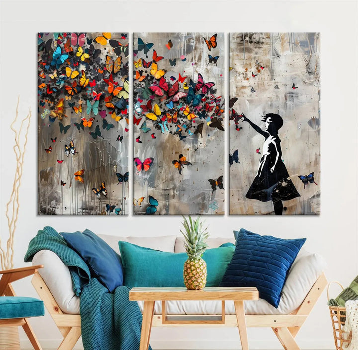 A triptych canvas print titled "Banksy Girl and Butterfly Explosion," showcasing a girl releasing colorful butterflies, enhances the space with its vibrant design. This abstract artwork is perfect for those seeking lively home decor and comes ready to hang.