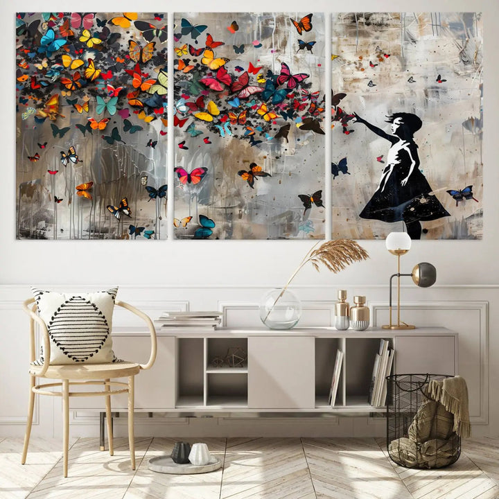 A triptych canvas print titled "Banksy Girl and Butterfly Explosion," showcasing a girl releasing colorful butterflies, enhances the space with its vibrant design. This abstract artwork is perfect for those seeking lively home decor and comes ready to hang.