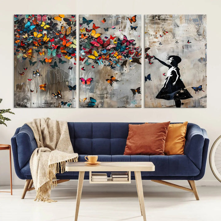 A triptych canvas print titled "Banksy Girl and Butterfly Explosion," showcasing a girl releasing colorful butterflies, enhances the space with its vibrant design. This abstract artwork is perfect for those seeking lively home decor and comes ready to hang.