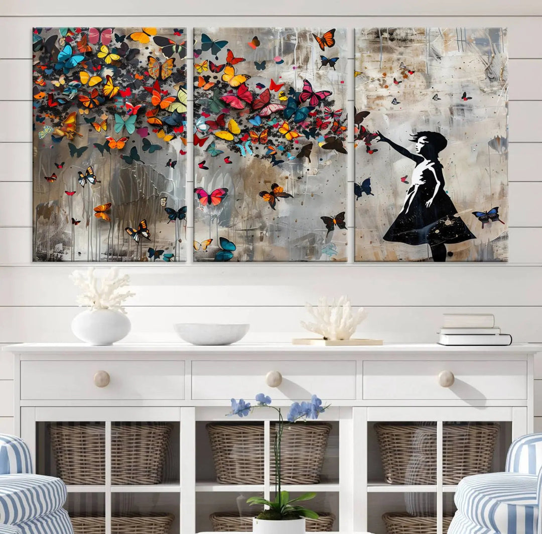 A triptych canvas print titled "Banksy Girl and Butterfly Explosion," showcasing a girl releasing colorful butterflies, enhances the space with its vibrant design. This abstract artwork is perfect for those seeking lively home decor and comes ready to hang.