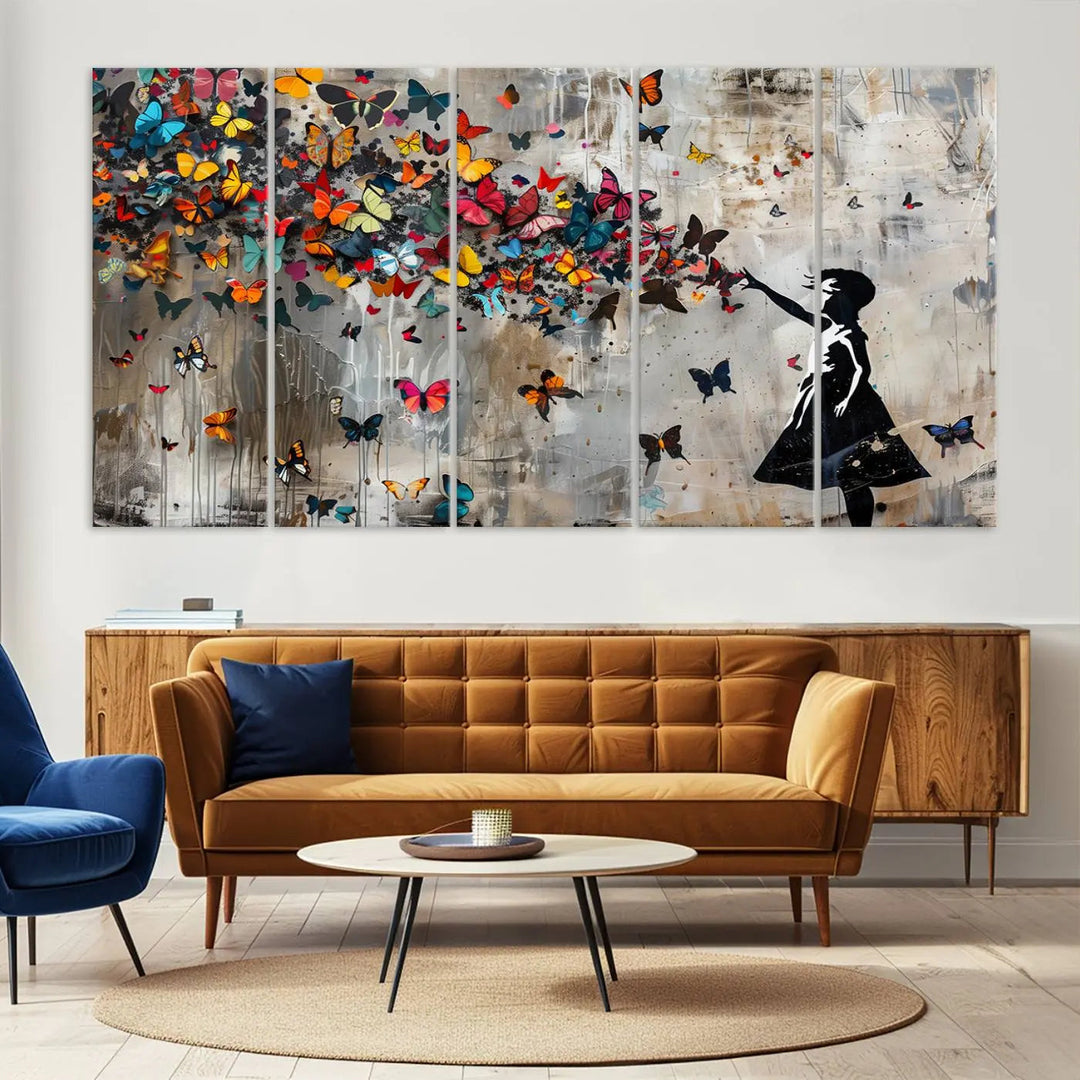 A triptych canvas print titled "Banksy Girl and Butterfly Explosion," showcasing a girl releasing colorful butterflies, enhances the space with its vibrant design. This abstract artwork is perfect for those seeking lively home decor and comes ready to hang.