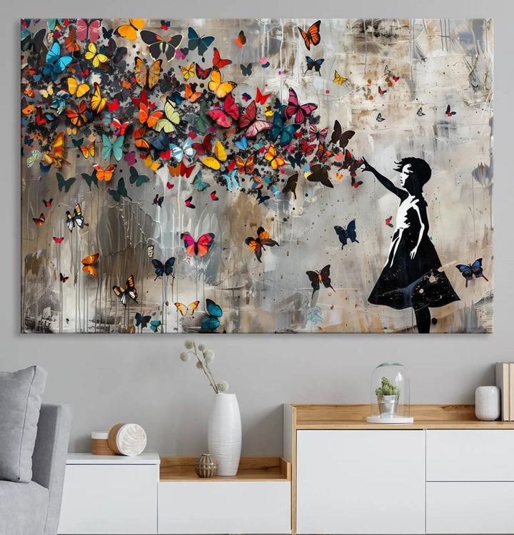 A triptych canvas print titled "Banksy Girl and Butterfly Explosion," showcasing a girl releasing colorful butterflies, enhances the space with its vibrant design. This abstract artwork is perfect for those seeking lively home decor and comes ready to hang.