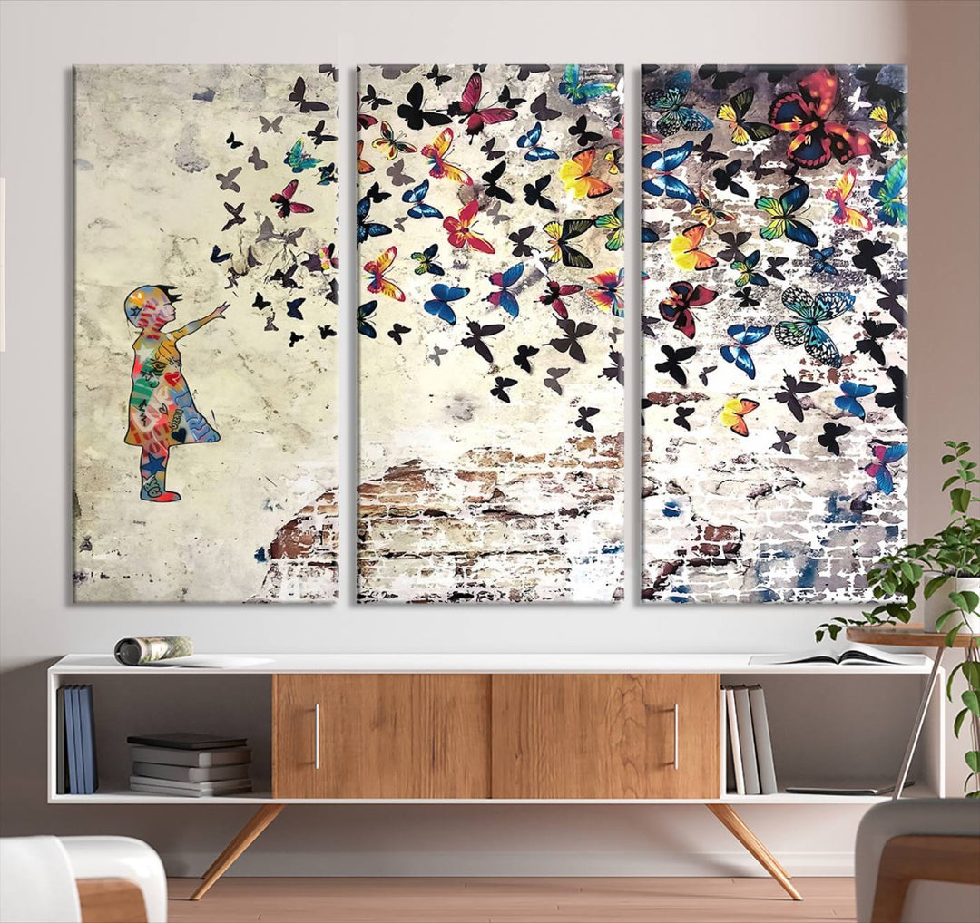 The vibrant street art print titled "Banksy Girl Butterfly Graffiti Wall Art Canvas Print - Butterfly Girl and Freedom Flight" captures attention with its depiction of a Butterfly Girl releasing colorful butterflies. Reminiscent of a Banksy creation, it exudes the charm of street art through its graffiti canvas style.