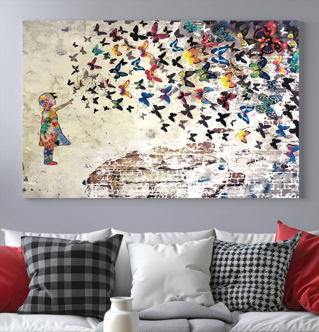 The vibrant street art print titled "Banksy Girl Butterfly Graffiti Wall Art Canvas Print - Butterfly Girl and Freedom Flight" captures attention with its depiction of a Butterfly Girl releasing colorful butterflies. Reminiscent of a Banksy creation, it exudes the charm of street art through its graffiti canvas style.