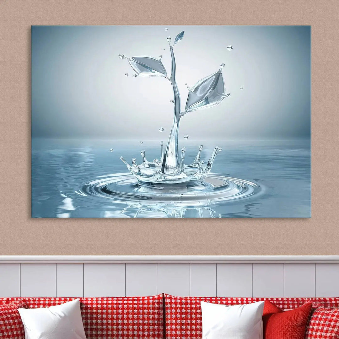 The living room features a three-panel wall art titled "Bathroom Wall Art Blue Leaf Canvas," showcasing water splash shapes that form plant-like designs on gallery-wrapped, museum-quality canvas.