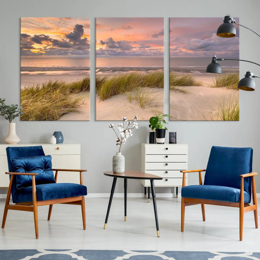 A triptych of serene sunset beach wall art graces the living room, with its museum-quality canvas accentuating the space. Each piece from the Beach Wall Art Canvas Print Sunset Artwork Print Coastal Wall Art collection comes ready to hang and features a UV-protective coating for lasting beauty.