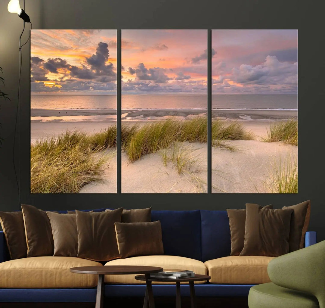 A triptych of serene sunset beach wall art graces the living room, with its museum-quality canvas accentuating the space. Each piece from the Beach Wall Art Canvas Print Sunset Artwork Print Coastal Wall Art collection comes ready to hang and features a UV-protective coating for lasting beauty.