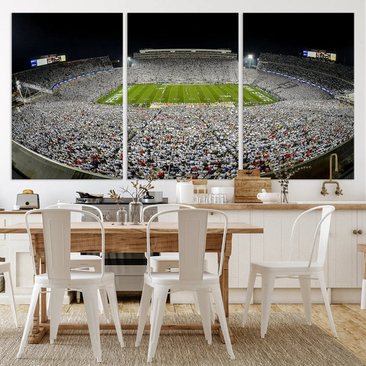 The Beaver Stadium Night Game Triple Canvas Wall Art - Penn State Nittany Lions Football Match features a panoramic view of a packed Beaver Stadium at night.